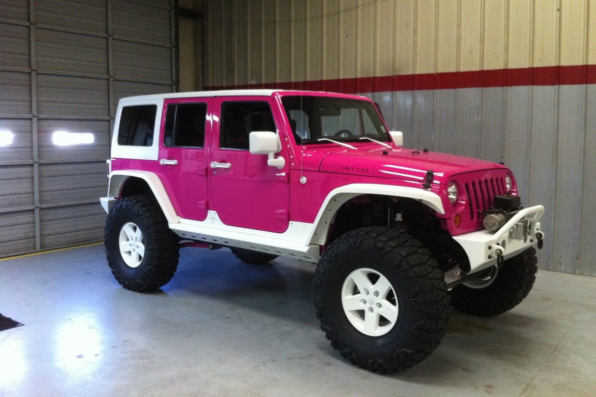 Pink and white Jeep Wrangler JK Rubicon 4-door